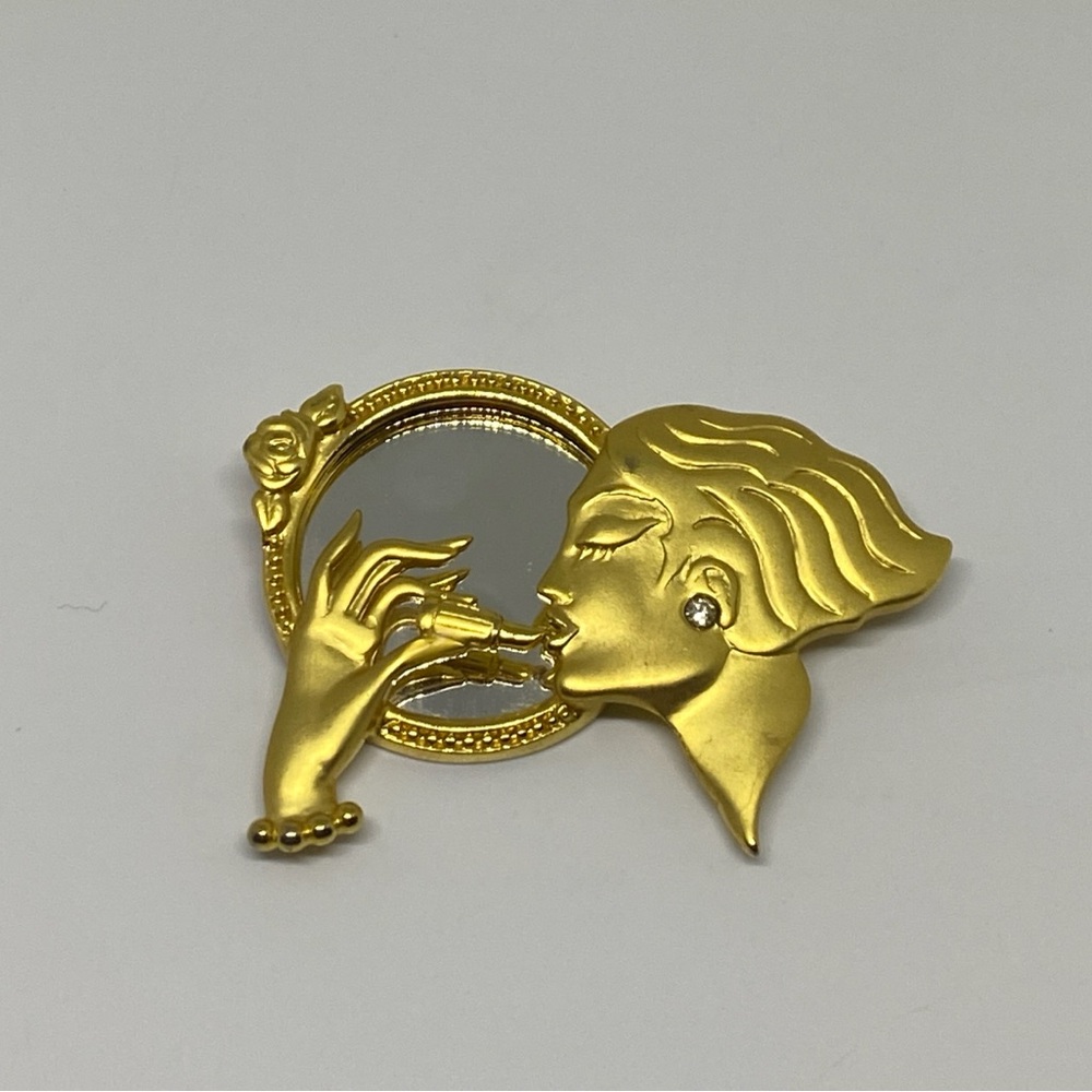 VTG Lady Putting Lipstick In Mirror  Gold Tone Brooch  AJC Collection
